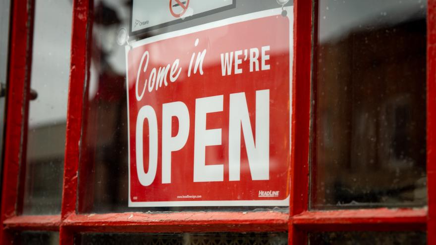 An open sign on a store's door