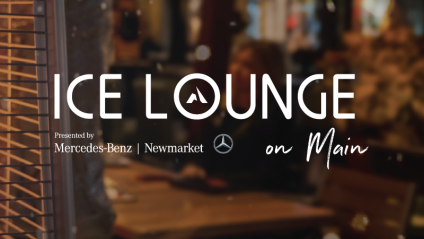 Outdoor lounge with blurred people and warm lighting | Ice Lounge on Main