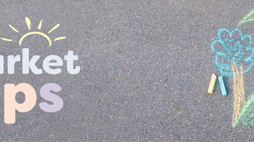 A girl drawing a house with sidewalk chalk and a banner that reads "Town of Newmarket Camps"