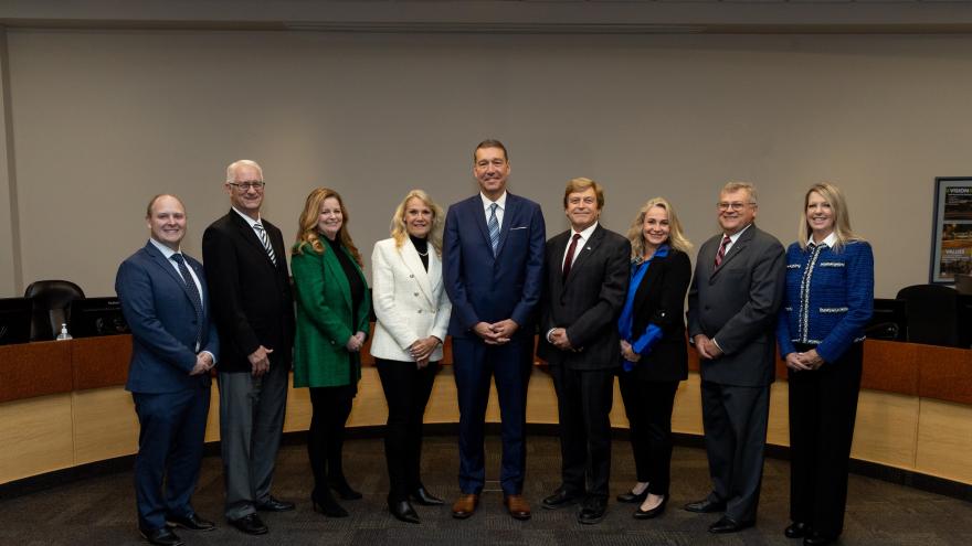 Mayor and members of Council standing in Council chambers