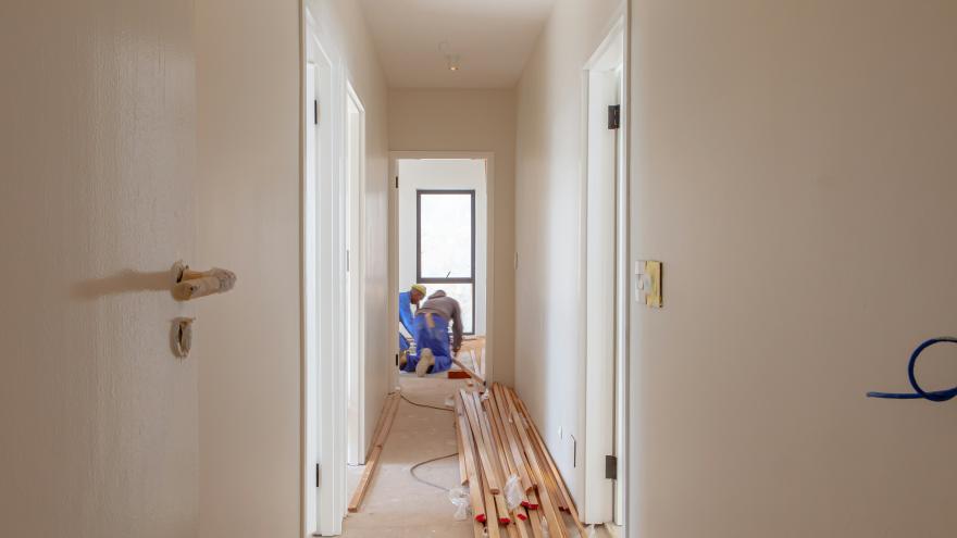 Workers renovating a home