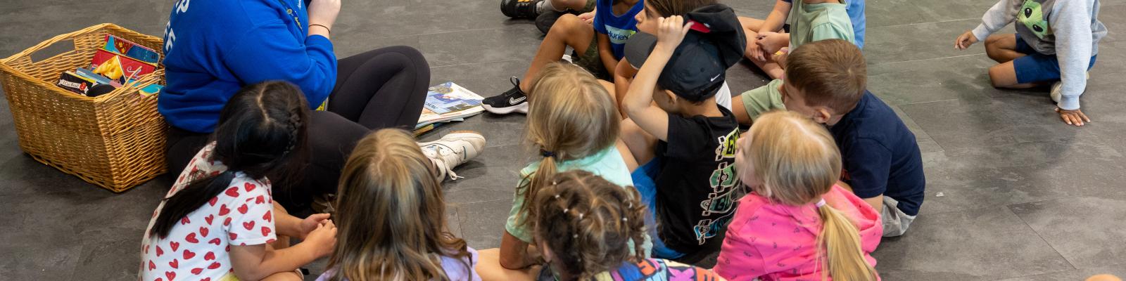 Children sitting listening to a storytime