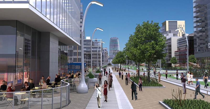 Modern city street with pedestrians, trees, and tall buildings on a sunny day.