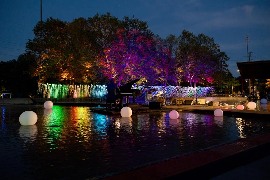 Fountain with colourful lights at night