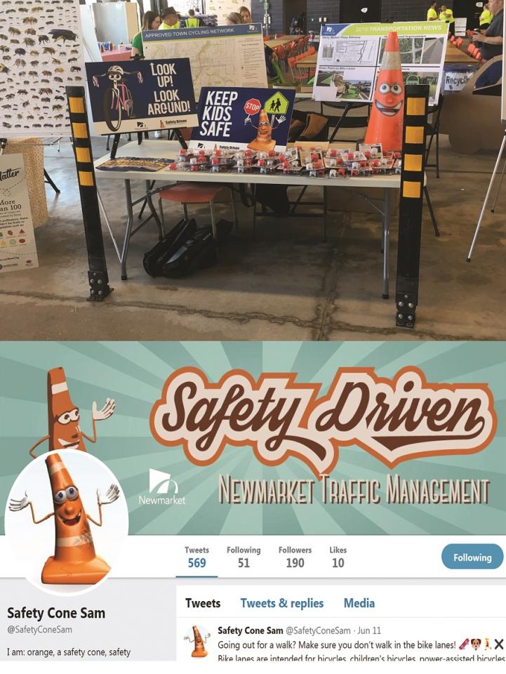 Traffic safety display with cones, road signs, and safety posters. Twitter page themed on road safety.