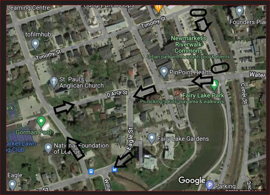 Satellite map with a river, roads, annotations, and arrows.