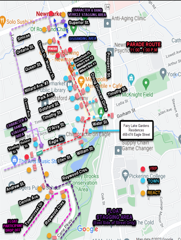 Map showing a parade route highlighted in red, with streets and locations labeled.