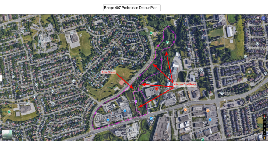 Satellite view of a suburban neighborhood with marked paths and labels.