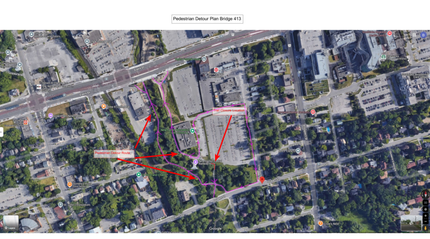 Aerial map view with red lines and labels highlighting specific areas.