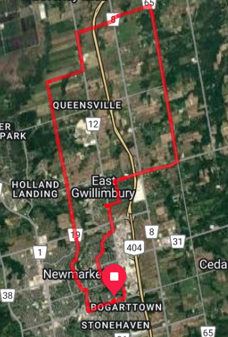 Map highlighting an area in red with labeled towns and roads.